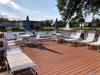 2nd floor 1/1 1/2 furnished condo in a very active 55+ on Pine Lakes Golf Club in Florida - for sale on GolfHomes.com, golf home, golf lot