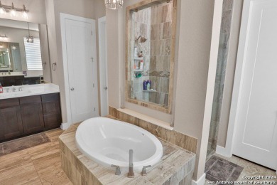 This spacious 3,681 sq ft energy-efficient home in Cibolo Canyon on TPC of San Antonio in Texas - for sale on GolfHomes.com, golf home, golf lot