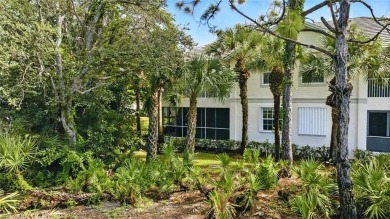 Stunning, completely remodeled end-unit first-floor coach home on West Bay Beach and Golf Club in Florida - for sale on GolfHomes.com, golf home, golf lot