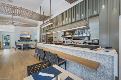 Stunning, completely remodeled end-unit first-floor coach home on West Bay Beach and Golf Club in Florida - for sale on GolfHomes.com, golf home, golf lot
