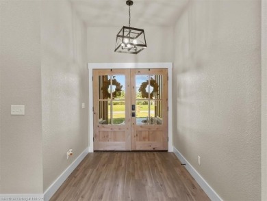 Step into this warm and charming BRAND NEW Construction Home on on Wolf Ridge Golf Course in Oklahoma - for sale on GolfHomes.com, golf home, golf lot