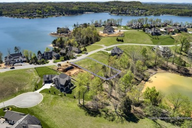 Large, beautiful waterfront lot perfectly situated on the on Wind River Golf Course in Tennessee - for sale on GolfHomes.com, golf home, golf lot
