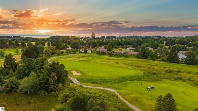 Experience luxury living on the 11th fairway of The Bear Golf on Grand Traverse Resort and Spa in Michigan - for sale on GolfHomes.com, golf home, golf lot