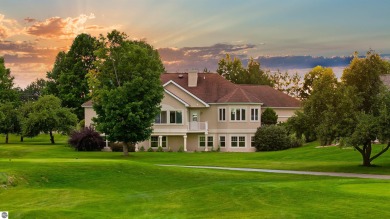 Experience luxury living on the 11th fairway of The Bear Golf on Grand Traverse Resort and Spa in Michigan - for sale on GolfHomes.com, golf home, golf lot