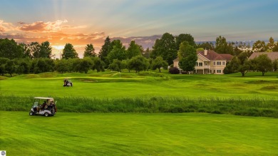 Experience luxury living on the 11th fairway of The Bear Golf on Grand Traverse Resort and Spa in Michigan - for sale on GolfHomes.com, golf home, golf lot