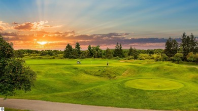 Experience luxury living on the 11th fairway of The Bear Golf on Grand Traverse Resort and Spa in Michigan - for sale on GolfHomes.com, golf home, golf lot