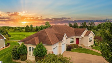 Experience luxury living on the 11th fairway of The Bear Golf on Grand Traverse Resort and Spa in Michigan - for sale on GolfHomes.com, golf home, golf lot