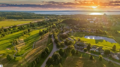 Experience luxury living on the 11th fairway of The Bear Golf on Grand Traverse Resort and Spa in Michigan - for sale on GolfHomes.com, golf home, golf lot