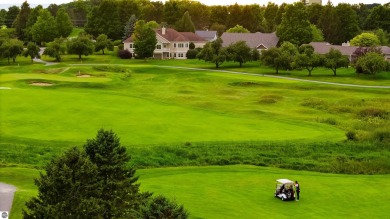 Experience luxury living on the 11th fairway of The Bear Golf on Grand Traverse Resort and Spa in Michigan - for sale on GolfHomes.com, golf home, golf lot