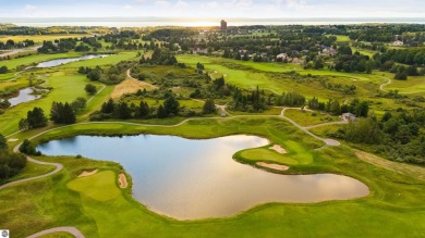 Experience luxury living on the 11th fairway of The Bear Golf on Grand Traverse Resort and Spa in Michigan - for sale on GolfHomes.com, golf home, golf lot