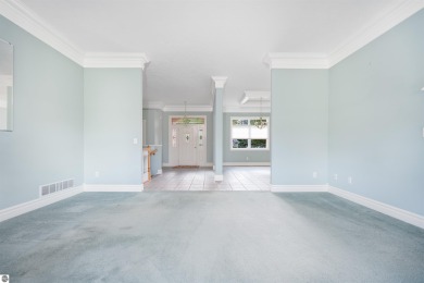 Experience luxury living on the 11th fairway of The Bear Golf on Grand Traverse Resort and Spa in Michigan - for sale on GolfHomes.com, golf home, golf lot