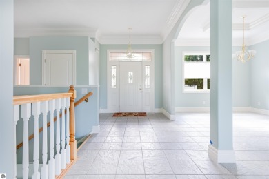 Experience luxury living on the 11th fairway of The Bear Golf on Grand Traverse Resort and Spa in Michigan - for sale on GolfHomes.com, golf home, golf lot