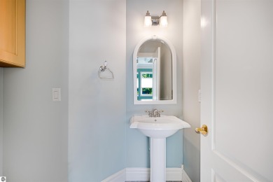 Experience luxury living on the 11th fairway of The Bear Golf on Grand Traverse Resort and Spa in Michigan - for sale on GolfHomes.com, golf home, golf lot