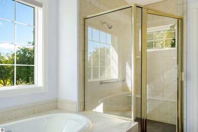 Experience luxury living on the 11th fairway of The Bear Golf on Grand Traverse Resort and Spa in Michigan - for sale on GolfHomes.com, golf home, golf lot