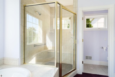 Experience luxury living on the 11th fairway of The Bear Golf on Grand Traverse Resort and Spa in Michigan - for sale on GolfHomes.com, golf home, golf lot