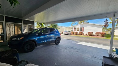 Nestled within the highly sought-after golf course community of on Blue Heron Pines Golf Course in Florida - for sale on GolfHomes.com, golf home, golf lot