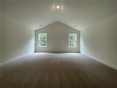 Stunning 2-story home with a 3rd car garage in a coveted on Traditions of Braselton Golf Club in Georgia - for sale on GolfHomes.com, golf home, golf lot