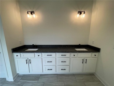 Stunning 2-story home with a 3rd car garage in a coveted on Traditions of Braselton Golf Club in Georgia - for sale on GolfHomes.com, golf home, golf lot