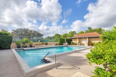 Beautifully appointed and renovated throughout in this 2 bedroom on BallenIsles Golf and Country Club in Florida - for sale on GolfHomes.com, golf home, golf lot