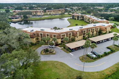 Beautifully appointed and renovated throughout in this 2 bedroom on BallenIsles Golf and Country Club in Florida - for sale on GolfHomes.com, golf home, golf lot