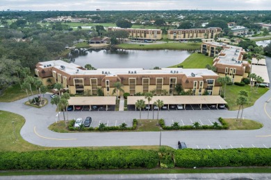 Beautifully appointed and renovated throughout in this 2 bedroom on BallenIsles Golf and Country Club in Florida - for sale on GolfHomes.com, golf home, golf lot