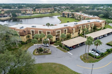 Beautifully appointed and renovated throughout in this 2 bedroom on BallenIsles Golf and Country Club in Florida - for sale on GolfHomes.com, golf home, golf lot