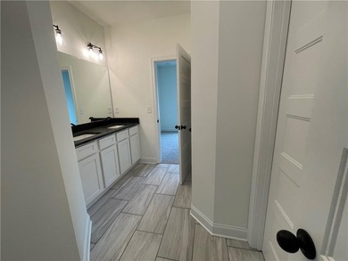 Stunning 2-story home with a 3rd car garage in a coveted on Traditions of Braselton Golf Club in Georgia - for sale on GolfHomes.com, golf home, golf lot