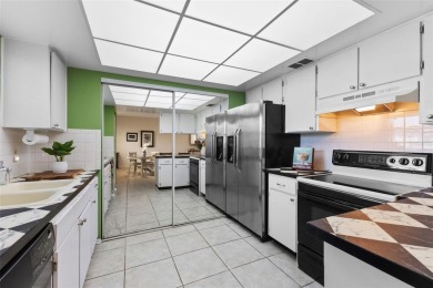 Experience easy Florida living in this bright and spacious on Tarpon Springs Golf Course in Florida - for sale on GolfHomes.com, golf home, golf lot