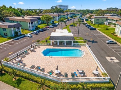 Experience easy Florida living in this bright and spacious on Tarpon Springs Golf Course in Florida - for sale on GolfHomes.com, golf home, golf lot