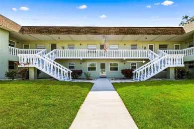 Experience easy Florida living in this bright and spacious on Tarpon Springs Golf Course in Florida - for sale on GolfHomes.com, golf home, golf lot