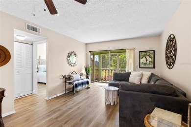 Experience easy Florida living in this bright and spacious on Tarpon Springs Golf Course in Florida - for sale on GolfHomes.com, golf home, golf lot