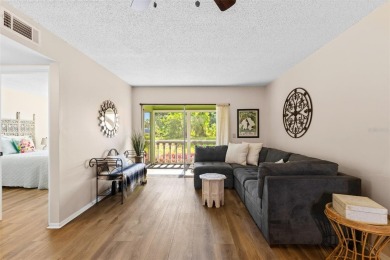 Experience easy Florida living in this bright and spacious on Tarpon Springs Golf Course in Florida - for sale on GolfHomes.com, golf home, golf lot