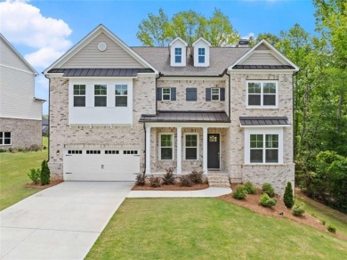 Discover luxury living in this barely lived-in gem nestled in on Traditions of Braselton Golf Club in Georgia - for sale on GolfHomes.com, golf home, golf lot
