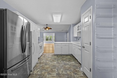 Welcome to this charming 3-bedroom, 2-bathroom home located in on Harbour Point Golf Club in North Carolina - for sale on GolfHomes.com, golf home, golf lot
