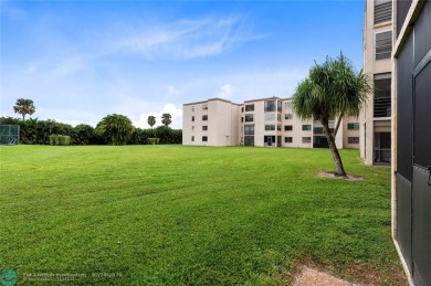 Welcome to this stunning 2-bed 2-bath condo located on the first on Boca Dunes Golf and Country Club in Florida - for sale on GolfHomes.com, golf home, golf lot