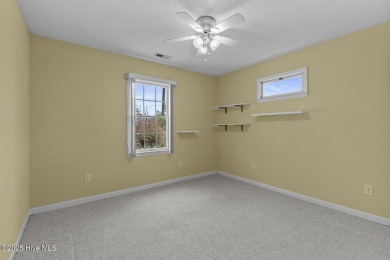 Welcome to this charming 3-bedroom, 2-bathroom home located in on Harbour Point Golf Club in North Carolina - for sale on GolfHomes.com, golf home, golf lot