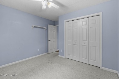 Welcome to this charming 3-bedroom, 2-bathroom home located in on Harbour Point Golf Club in North Carolina - for sale on GolfHomes.com, golf home, golf lot