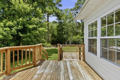 Welcome to this charming 3-bedroom, 2-bathroom home located in on Harbour Point Golf Club in North Carolina - for sale on GolfHomes.com, golf home, golf lot