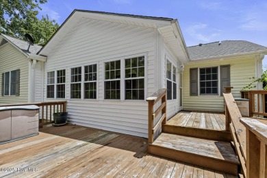Welcome to this charming 3-bedroom, 2-bathroom home located in on Harbour Point Golf Club in North Carolina - for sale on GolfHomes.com, golf home, golf lot