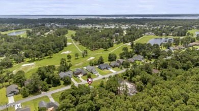 Welcome to this charming 3-bedroom, 2-bathroom home located in on Harbour Point Golf Club in North Carolina - for sale on GolfHomes.com, golf home, golf lot