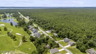 Welcome to this charming 3-bedroom, 2-bathroom home located in on Harbour Point Golf Club in North Carolina - for sale on GolfHomes.com, golf home, golf lot