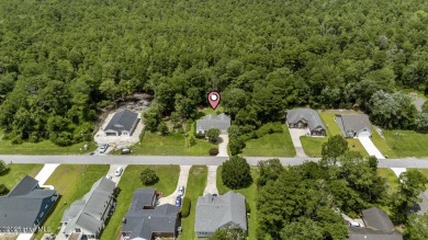 Welcome to this charming 3-bedroom, 2-bathroom home located in on Harbour Point Golf Club in North Carolina - for sale on GolfHomes.com, golf home, golf lot
