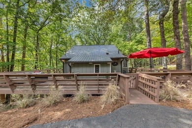 Step inside to discover a warm, inviting interior featuring on The Highlands Course at Lake Arrowhead in Georgia - for sale on GolfHomes.com, golf home, golf lot