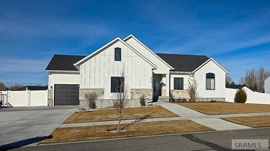Welcome to this attractive 6-bedroom, 3-bath home located in on Teton Lakes Golf Courses in Idaho - for sale on GolfHomes.com, golf home, golf lot