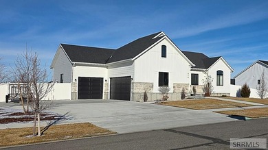 Welcome to this attractive 6-bedroom, 3-bath home located in on Teton Lakes Golf Courses in Idaho - for sale on GolfHomes.com, golf home, golf lot