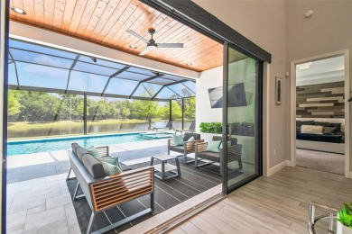 GORGEOUS POOL HOME - PREMIUM LOT - WATERFRONT - GOLF COURSES - on The Eagles Golf Course and Club in Florida - for sale on GolfHomes.com, golf home, golf lot