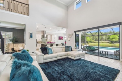 STUNNING POOL HOME ON PREMIUM WATERFRONT CUL-DE-SAC LOT - LUXURY on The Eagles Golf Course and Club in Florida - for sale on GolfHomes.com, golf home, golf lot