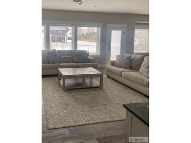 Welcome to this attractive 6-bedroom, 3-bath home located in on Teton Lakes Golf Courses in Idaho - for sale on GolfHomes.com, golf home, golf lot