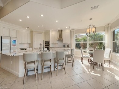 Welcome to your carefree Florida life in this stunning second on Shadow Wood Preserve in Florida - for sale on GolfHomes.com, golf home, golf lot