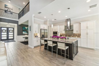 GORGEOUS POOL HOME - PREMIUM LOT - WATERFRONT - GOLF COURSES - on The Eagles Golf Course and Club in Florida - for sale on GolfHomes.com, golf home, golf lot